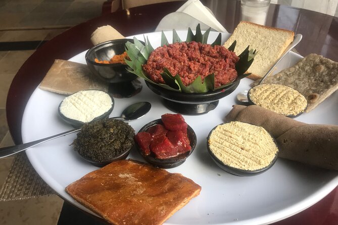 Go wheretheLocalsgo, Eatwhat thelocalseat!open Market&More Tours - Eating Ethiopian food at Yobez Traditional Restaurant