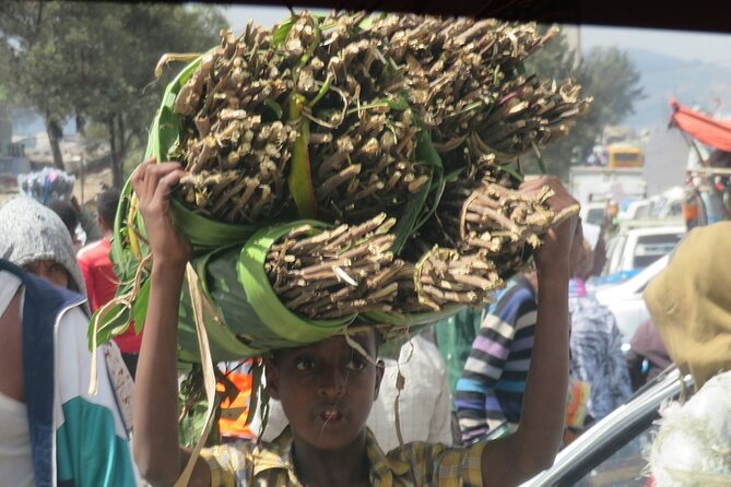 Go wheretheLocalsgo, Eatwhat thelocalseat!open Market&More Tours - The Lion of Judah and Addis Ababa’s royal symbol